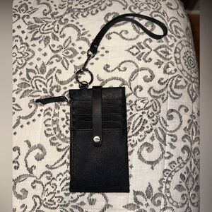 Calvin Klein card holder wristlet 10 pockets total. Front is the same as back